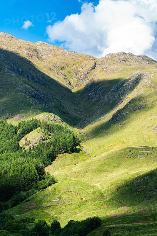 Mountains in Lights and Shadows over Glenfinnan Viaduct, West Highland Line in Glenfinnan