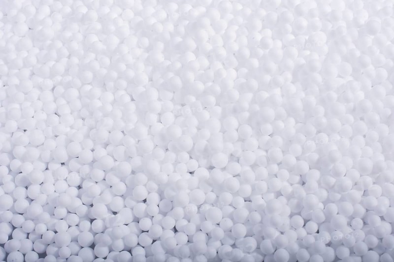 White little polystyrene foam balls as background,
