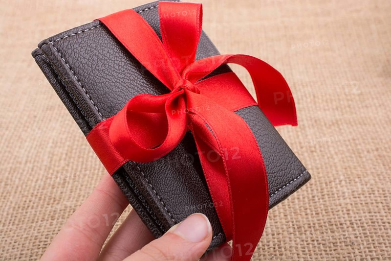 Brown color ribbon onbrown linen canvas,