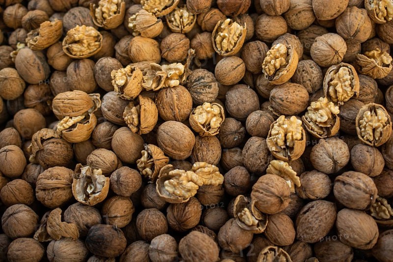 Whole walnuts background. Healthy organic food concept,