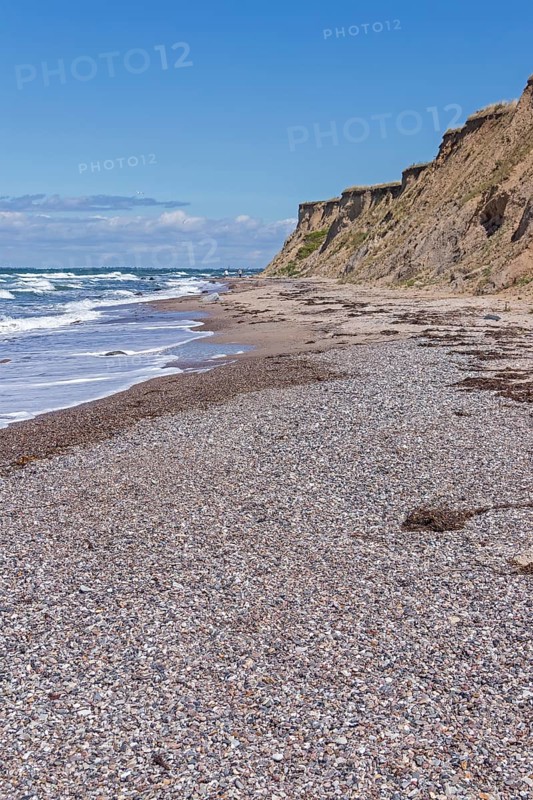 Shingle beach, steep coast