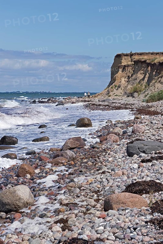 Shingle beach, steep coast