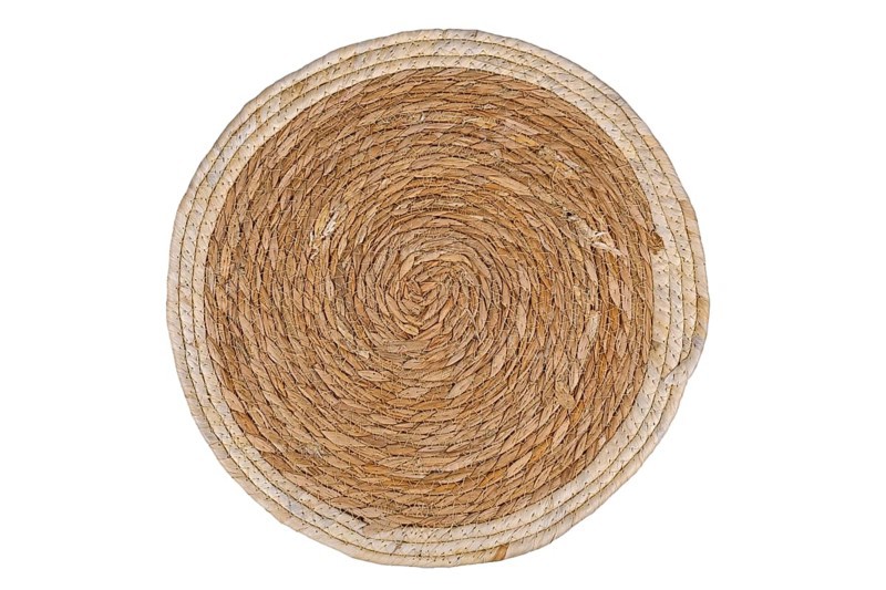 Top view of round weave wicker placemat on white background,