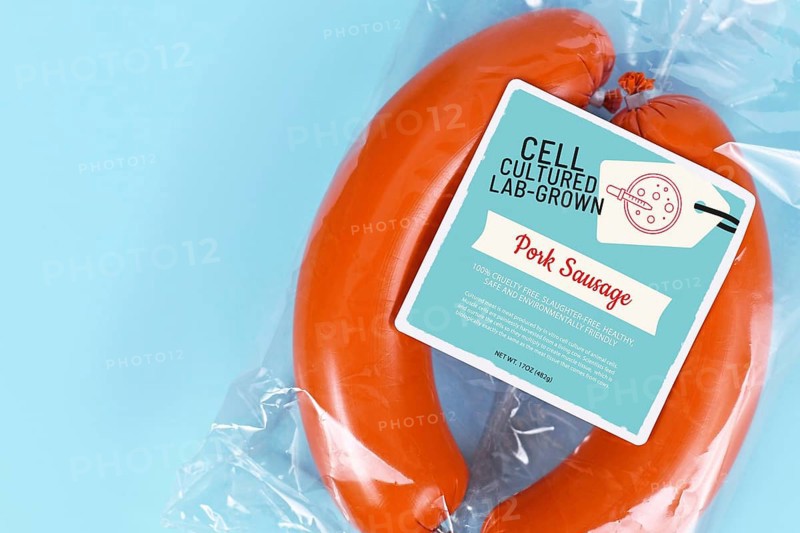 Lab grown cell cultured meat concept for artificial meat showing packed pork sausages with made up label,