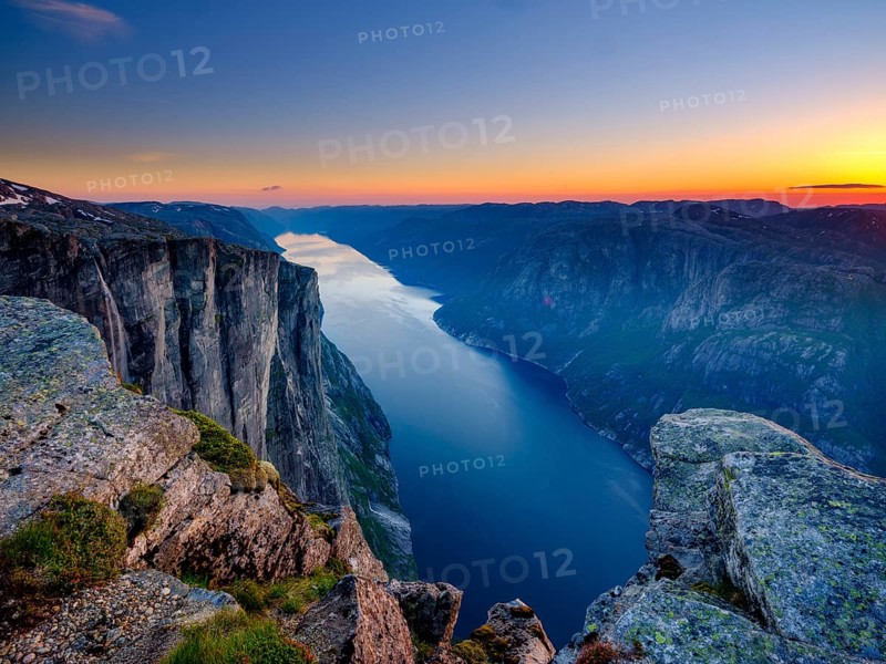 Rock face of Kjerag above Lysefjord at dusk, Lyseboten