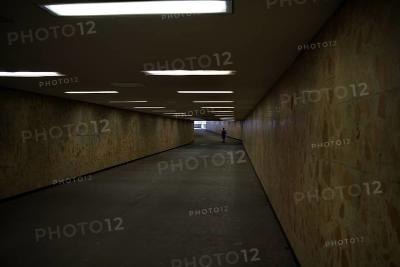 A woman in the pedestrian subway at Springpfuhl S-Bahn station, Marzahn-Hellersdorf district