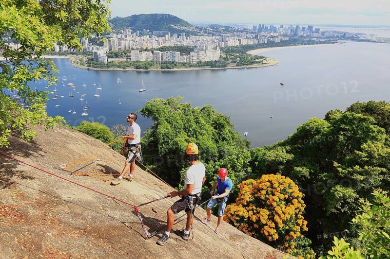Climbers practising on Sugar Loaf Mountain, Pao de Acucar