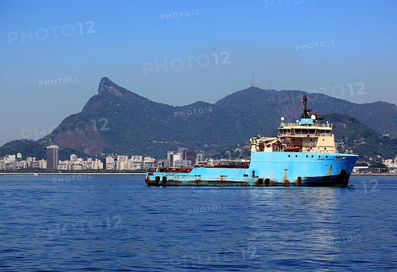 Cargo ferry in the bay. The Baia de Guanbara Bay in the east of Rio de Janeiro, overlooking the Christo Rei