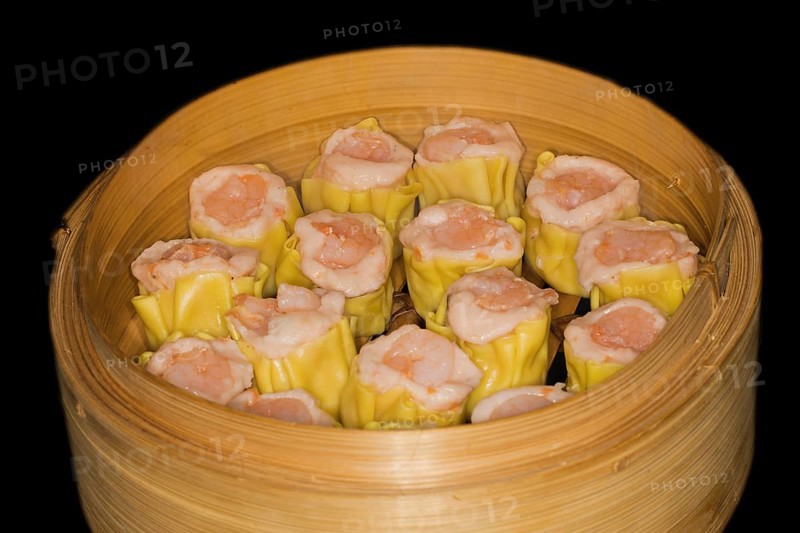 Dim Sum with fish farce and prawns, food photography with black background