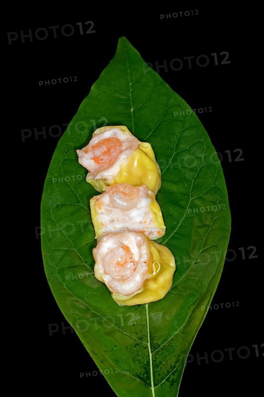 Dim Sum with fish farce and prawns, food photography with black background