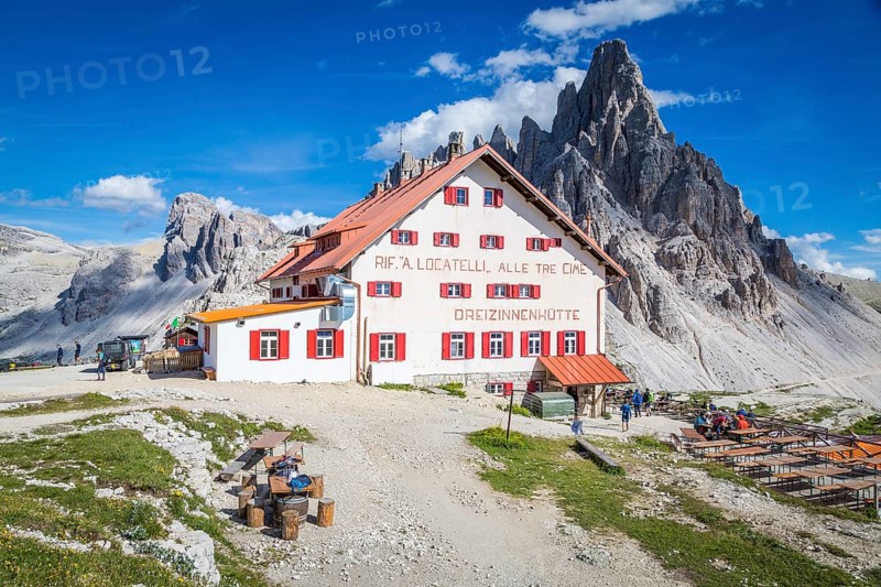 Mountain hut Dreizinnenhuette, behind rock massif Paternkofel