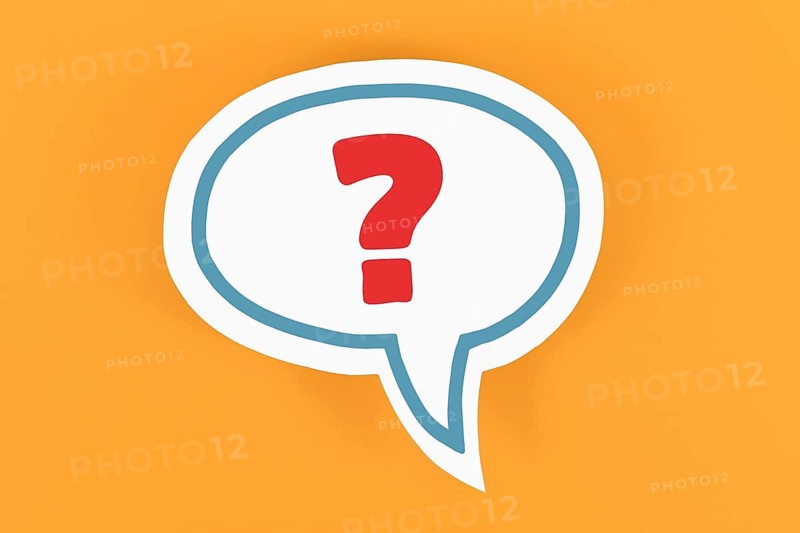 White speech bubble with question mark on yellow background,