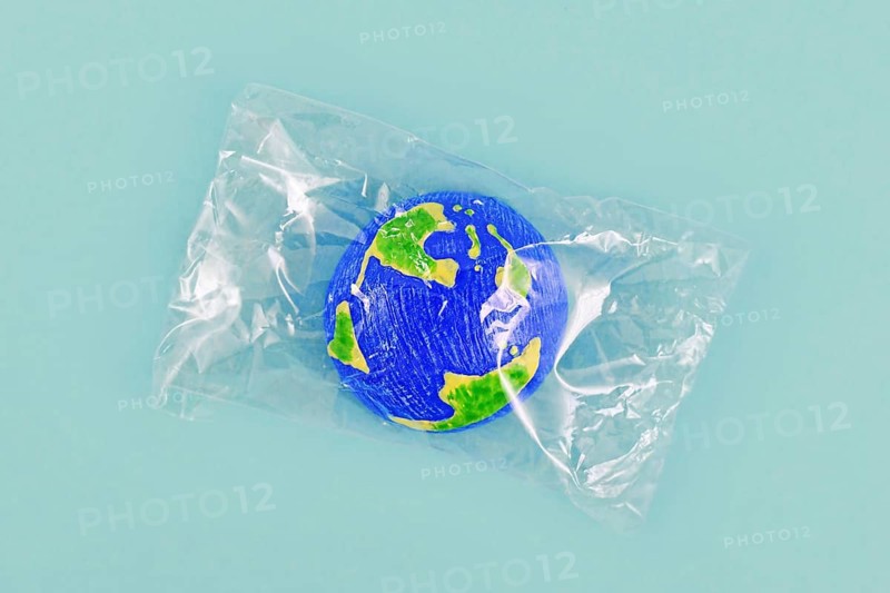 Small planet earth model wrapped in plastic,