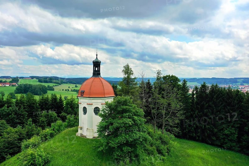 Aerial view of Ottobeuren at the Buschelkapelle in cloudy weather. Unterallgaeu, Swabia