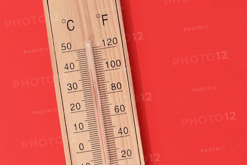 Thermometer showing 40 degrees Celsius or 104 degrees Fahrenheit during summer heat wave,