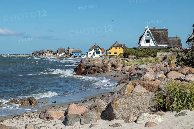Thatched roof houses on the beach, Graswarder peninsula