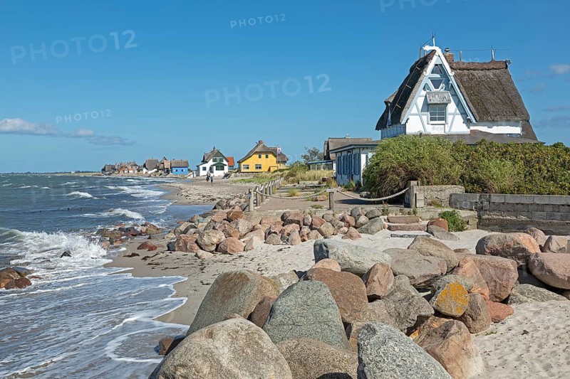 Thatched roof houses on the beach, Graswarder peninsula
