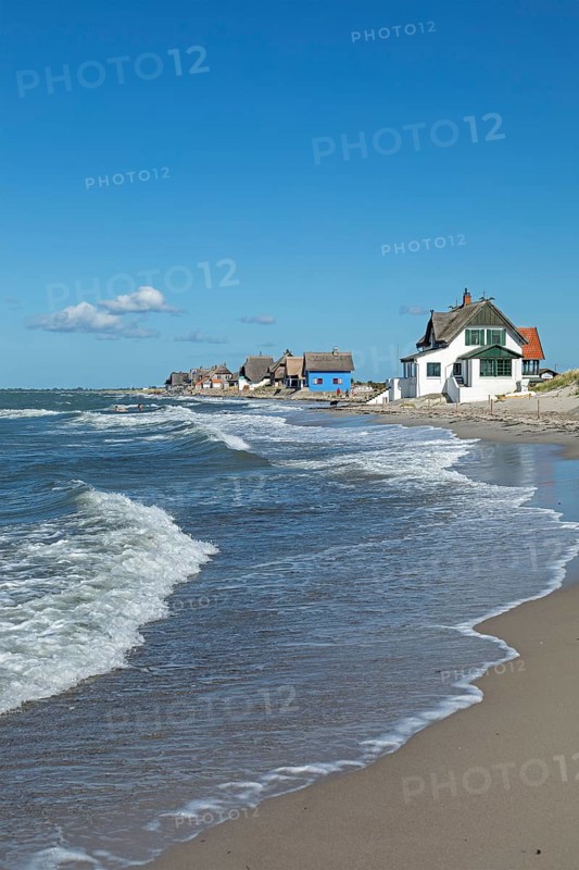Thatched roof houses on the beach, Graswarder peninsula