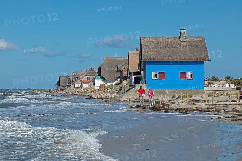 Thatched roof houses on the beach, Graswarder peninsula