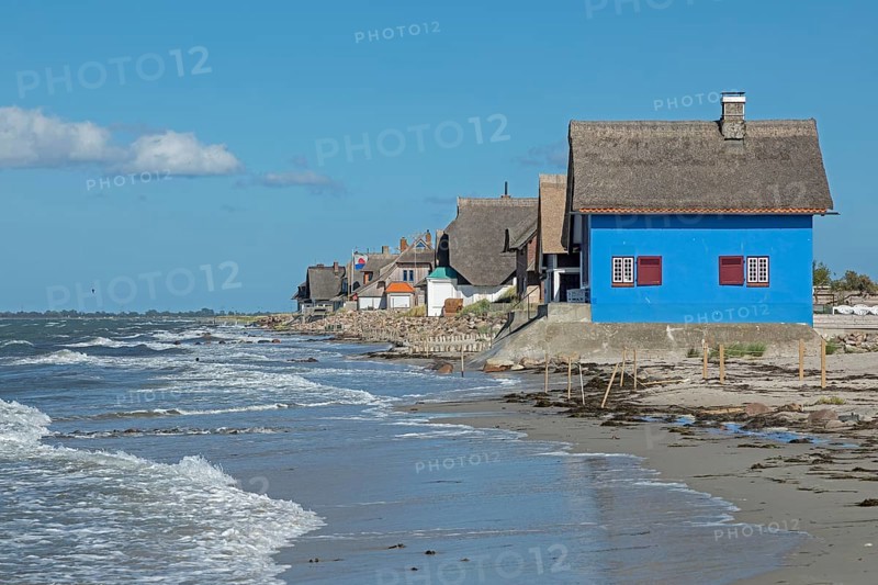 Thatched roof houses on the beach, Graswarder peninsula