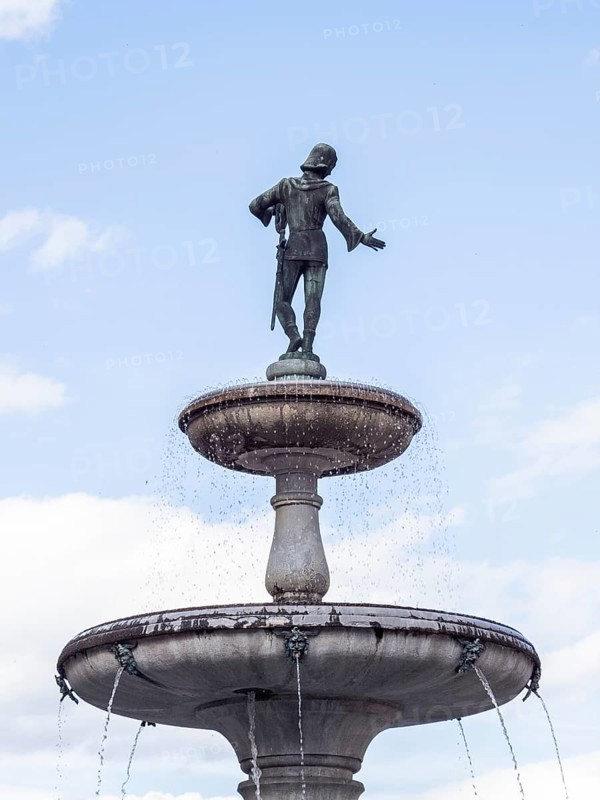 Walther von der Vogelweide Fountain on the main square of St. Veit an der Glan, St. Veit