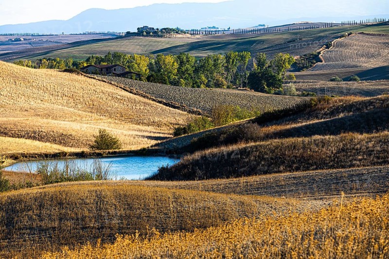 Reservoir in hilly landscape, near Siena