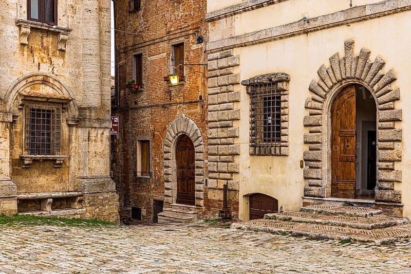Entrances to houses in Piazza Grande, Montepulciano