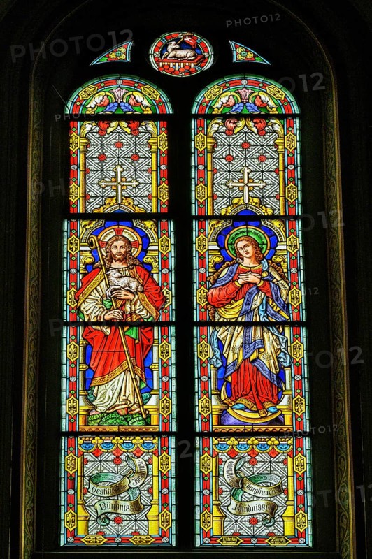 Colourful church window from 1891, Kath. parish church