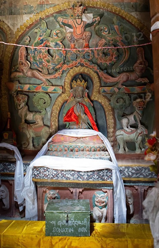 Black saint figure with prayer cloths, Lamayuru Monastery or Lamayuru Gompa