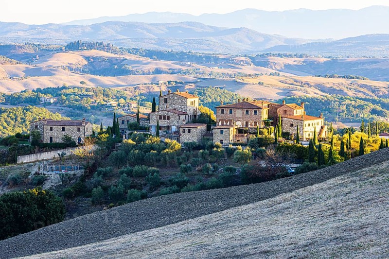 Country houses in the hilly landscape of the Crete Senesi, near Asciano