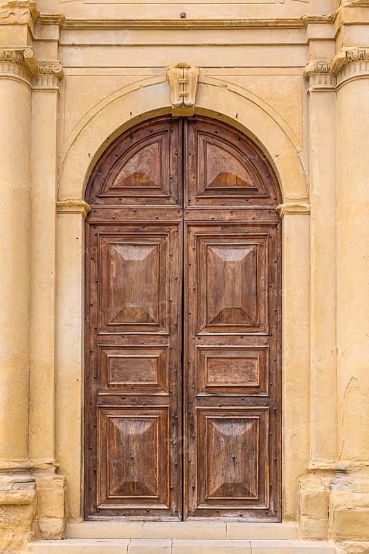 Side entrance of the Palazzo della Fraterini dei Laici, Piazza Grande