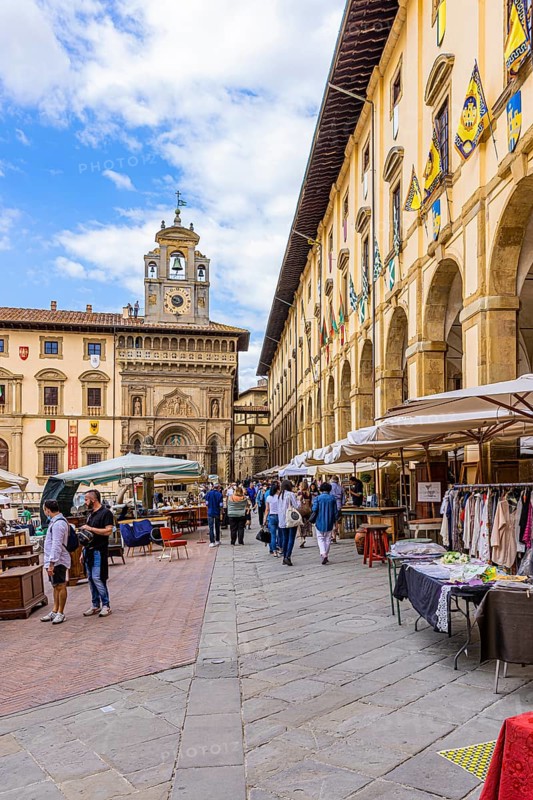 Stalls at the antique market in the old town of Arezzo, Piazza Grande