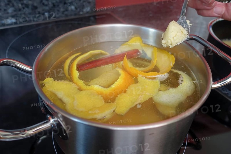 Swabian cuisine, preparation of sweet semolina dumplings in hot water with oranges and lemon zest
