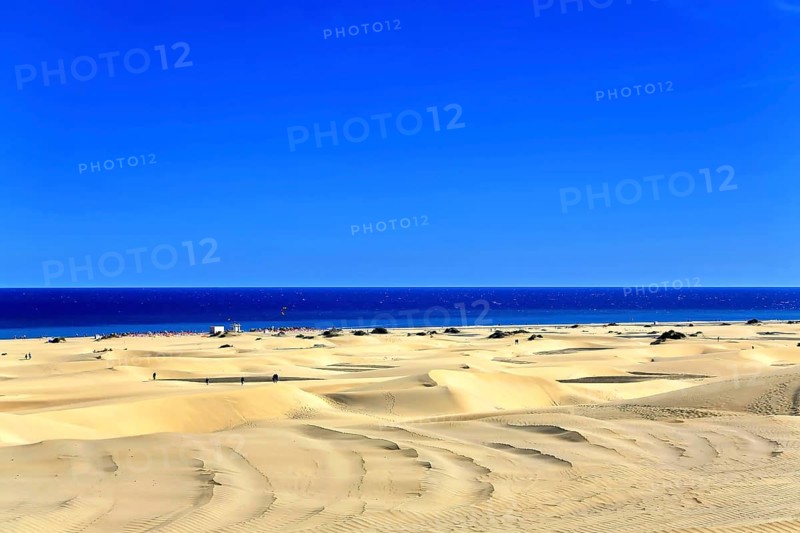 The dunes of Playa Del Ingles with a view of the Atlantic Ocean. San Bartolome de Tirajana, Gran Canaria