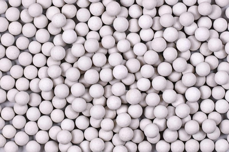 Top view of ceramic pie weights used to keep crust from shrinking during blind baking,