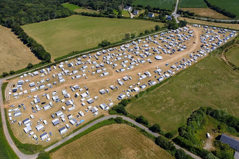 Aerial view of Gens de Voyage or Travelling People camp set up without permission in a field in Dirinon, Finistere Penn-ar-Bed department