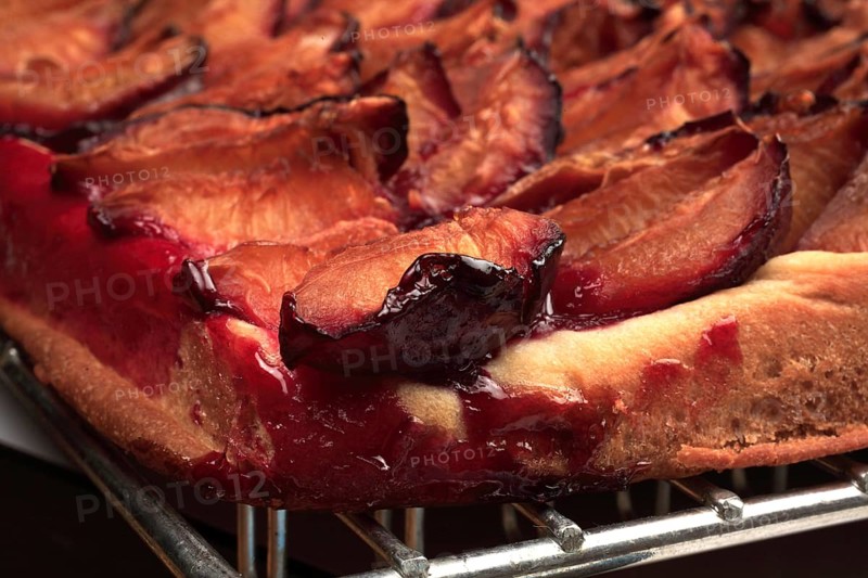 Plums on a plum cake,