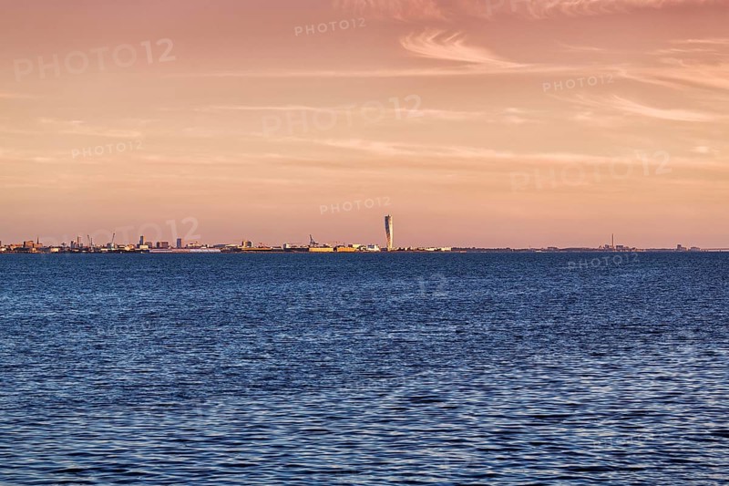 View over the Oeresund to the skyline of Malmoe, Turning Torso skyscraper on the horizon