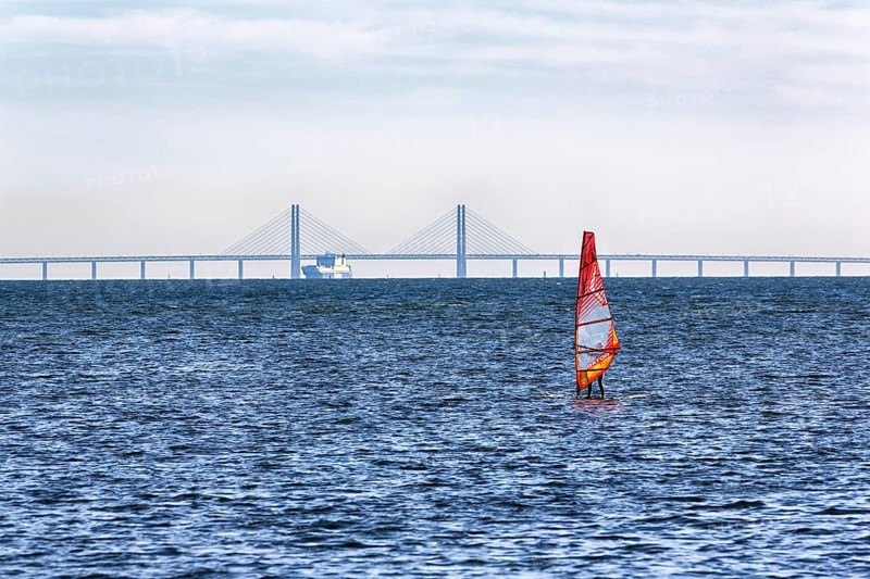 Windsurfers in front of the Oeresund Bridge, Oresundsbroen between Malmoe and Copenhagen