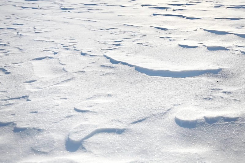 Snow drifts caused by wind from powder snow look like dunes and form bizarre patterns and structures,
