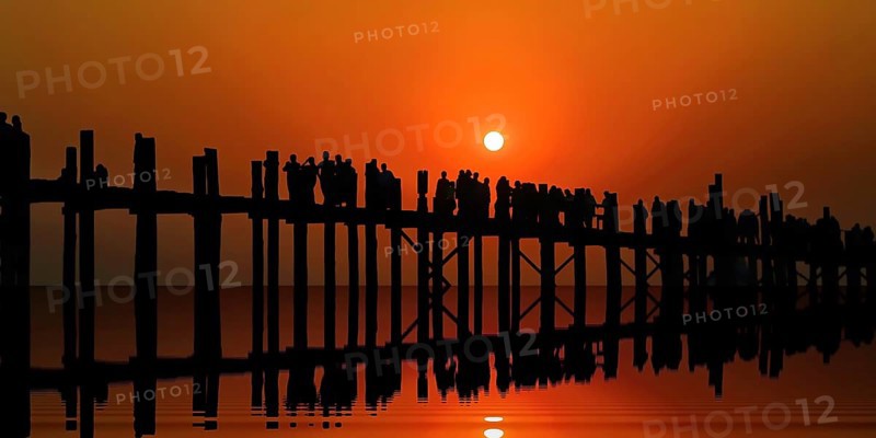 Teak U-leg bridge at sunset. Amarapura, Taungthaman Lake