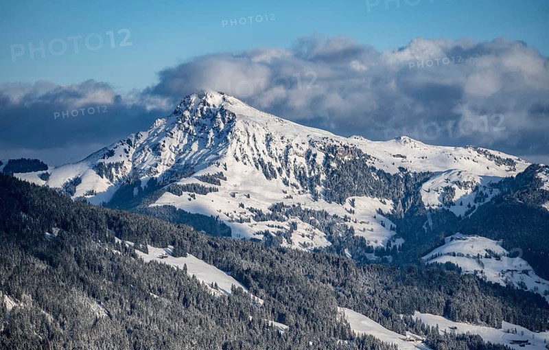 View of the Kitzbueheler Horn, Alps in winter with snow-covered mountains