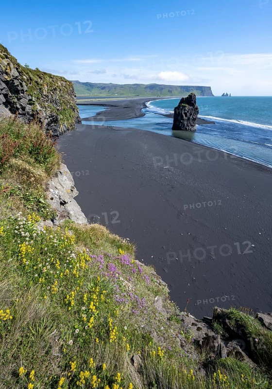 Rocks in the sea, View over Reynisfjara Beach