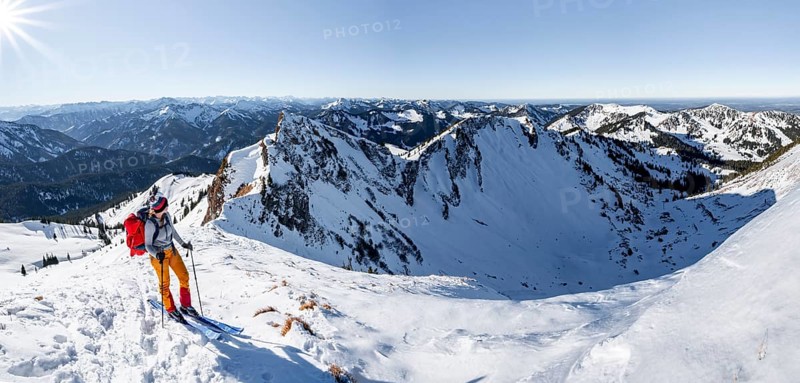 Ski tourers in winter on the snow-covered Rotwand, mountains in winter