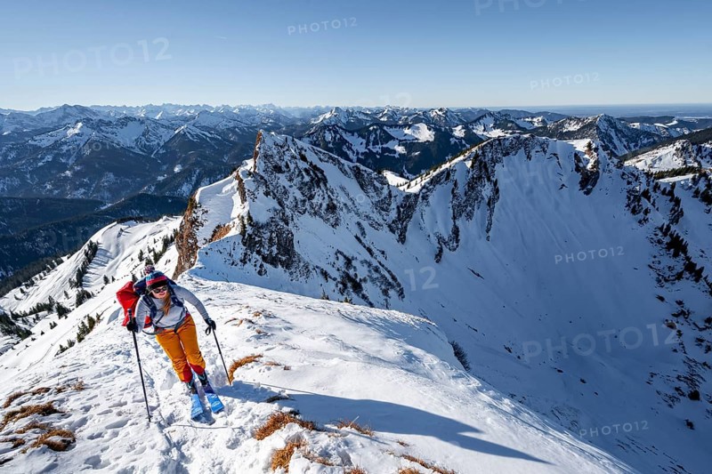Ski tourers in winter on the snow-covered Rotwand, mountains in winter