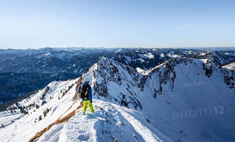 Ski tourers in winter on the snow-covered Rotwand, mountains in winter