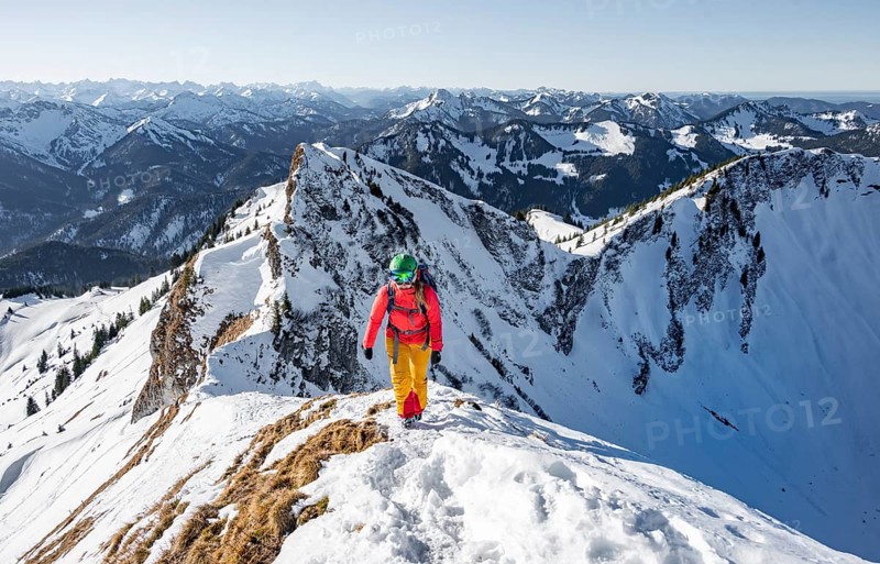 Ski tourers in winter on the snow-covered Rotwand, mountains in winter
