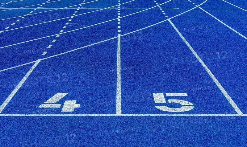 Blue tartan track on a sports field, Berlin
