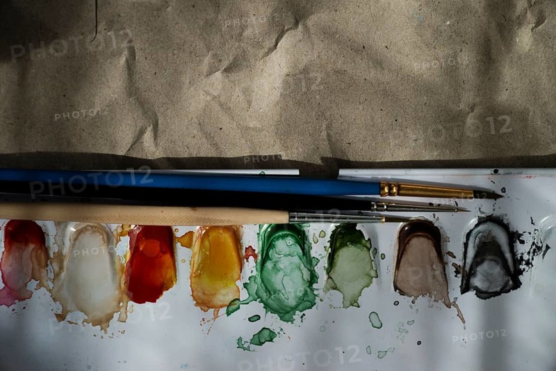 Watercolour paint box with brushes,