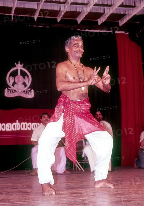 Kalamandalam Gopi demonstrating kathakali exercise in Kerala Kalamandalam, Cheruthuruthy near Soranur